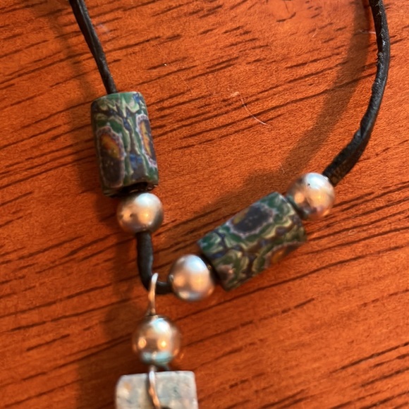 Beautiful boho style necklace with chunky blue stone cross on a leather cord. - Picture 3 of 16
